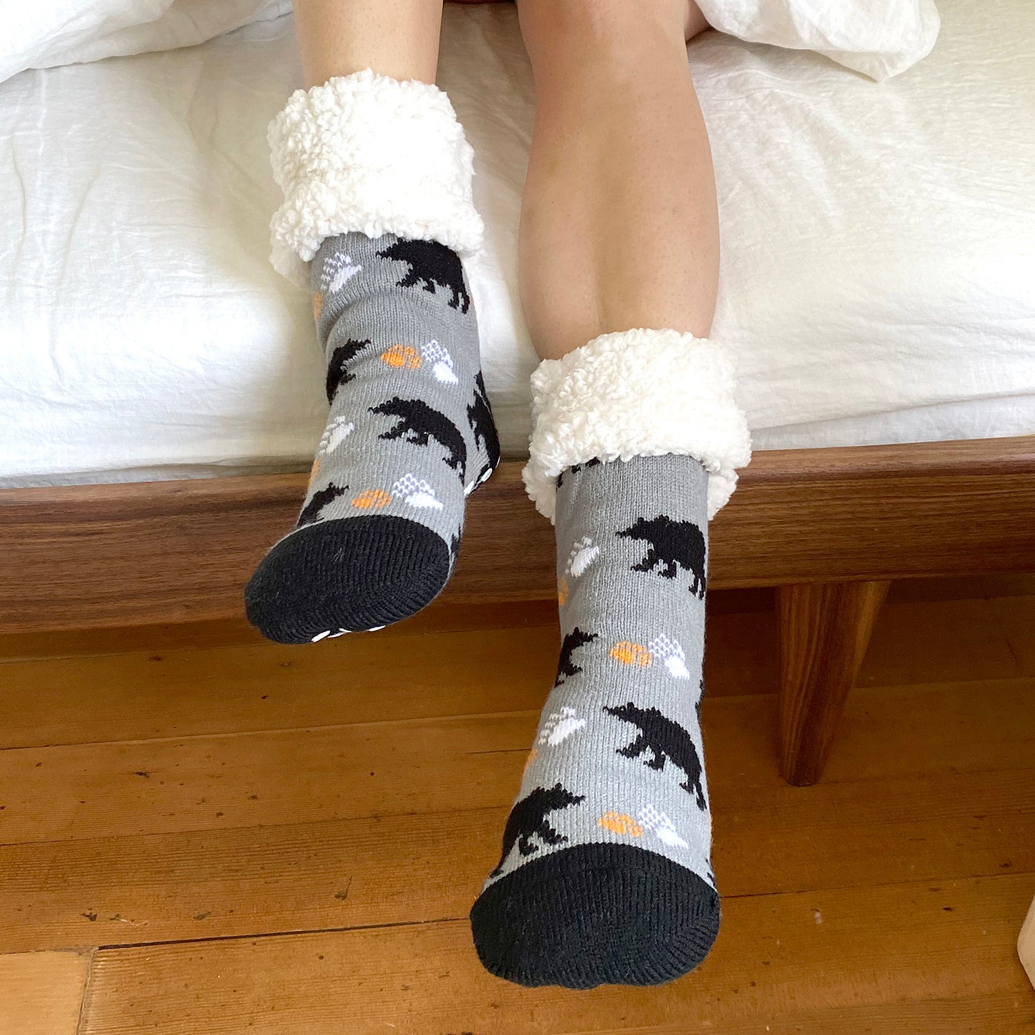 Pudus Cozy Winter Slipper Socks for Women and Men with Non-Slip Grippers and Faux Fur Sherpa Fleece - Adult Regular Fuzzy Socks Black Bear - Classic Slipper Sock